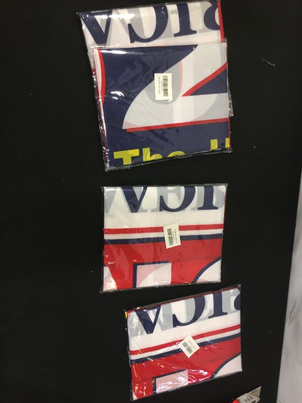 Photo 1 of 4 PACK OF RE ELECT TRUMP FLAGS 