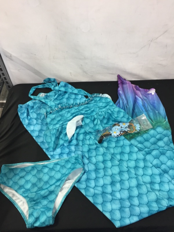 Photo 1 of KIDS SIZE LARGE MERMAID OUTFIT (MAJOR DAMAGES TO PACKAGING)