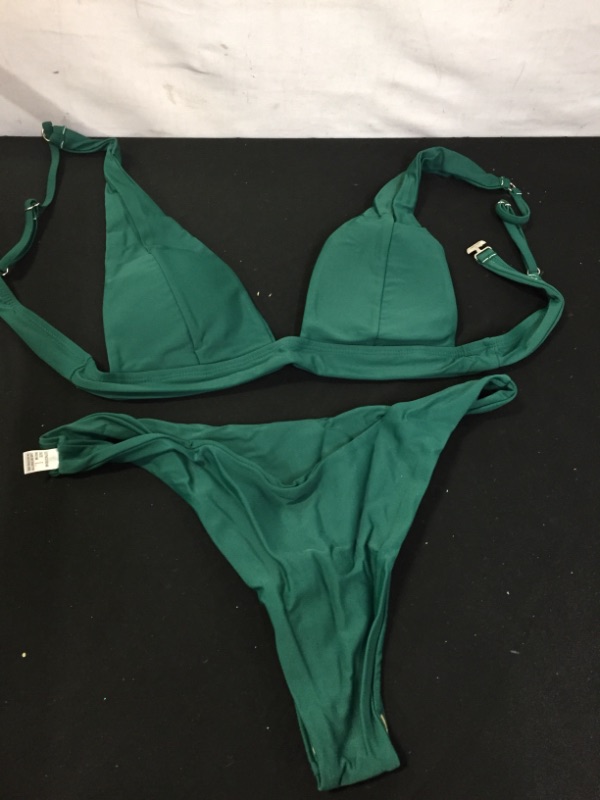 Photo 1 of WOMEN'S 2 PIECE BATHING SUIT SIZE LARGE (DAMAGES TO PACKAGING)