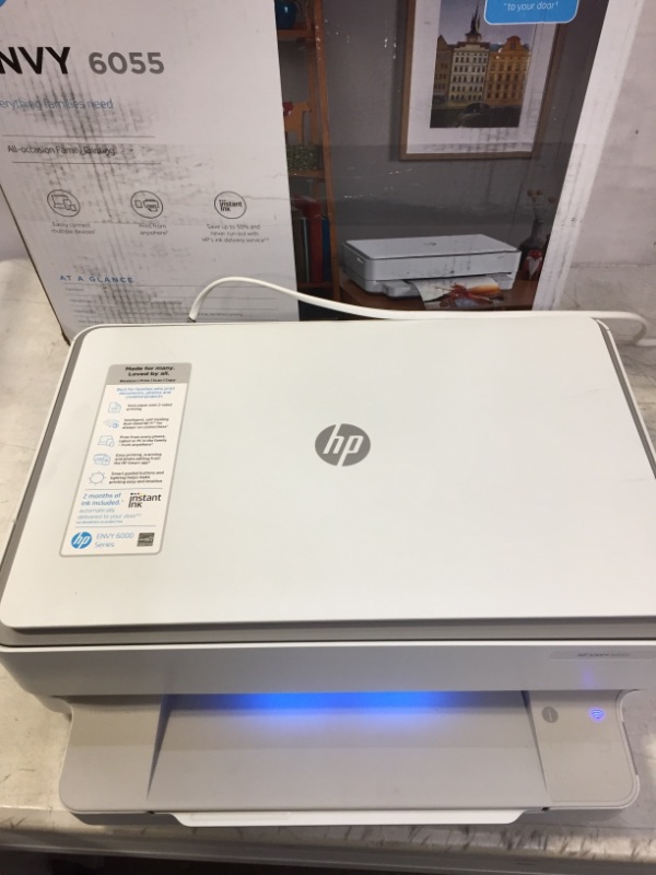 Photo 3 of HP ENVY 6055 Wireless All-in-One Printer, Mobile Print, Scan & Copy, HP Instant Ink ready, Works with Alexa (5SE16A) (MAJOR DAMAGES TO LATCH ON PRINTER AND SCRATCHES AND DIRT ON ITEM INDICATE PRIOR USE)