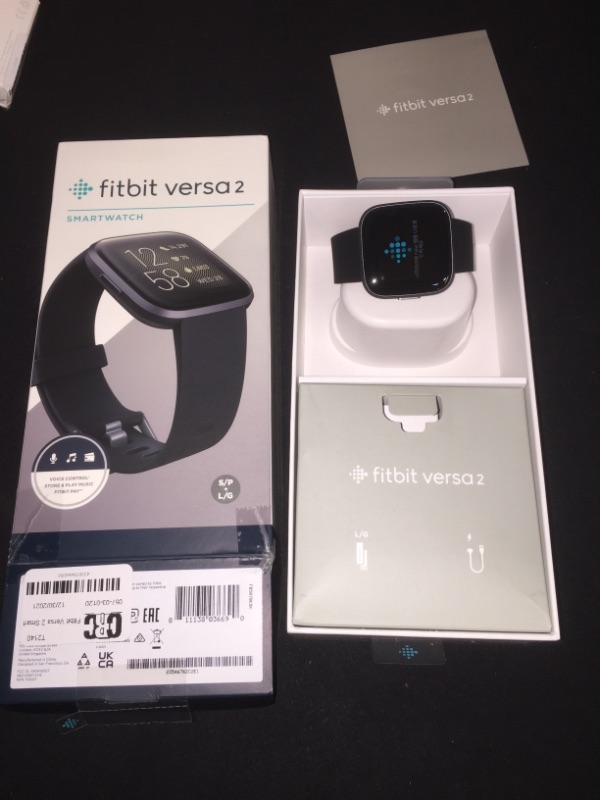 Photo 2 of Fitbit Versa 2 Health and Fitness Smartwatch with Heart Rate, Music, Alexa Built-In, Sleep and Swim Tracking, Black/Carbon, One Size (S and L Bands Included)
