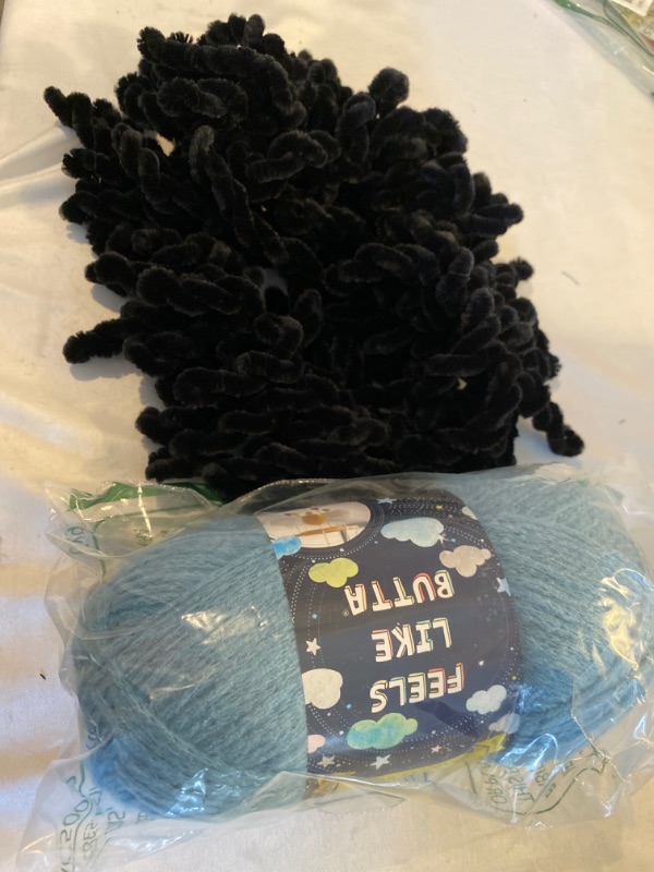 Photo 1 of 2PC LOT
Lion Brand Yarn Feels Like Butta Yarn, Dusty Blue

BLACK ELASTIC WITH TWIST YARN