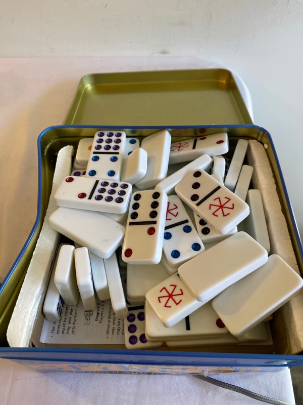 Photo 1 of Spinner: The Game of Wild Dominoes, Double 9 Set Plus 11 Wild Spinner Tiles Board Game, Tin Box Carrying Case