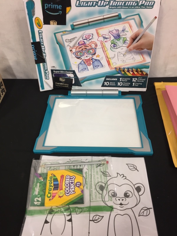 Photo 2 of 2PC LOT
Crayola Light Up Tracing Pad Teal, Kids Drawing Tablet, Gifts, Kids Toys, Ages 6, 7, 8, 9, 10
PK OF PINK CONSTRUCTION PAPER, COUNT UNKNOWN, OPENED PK