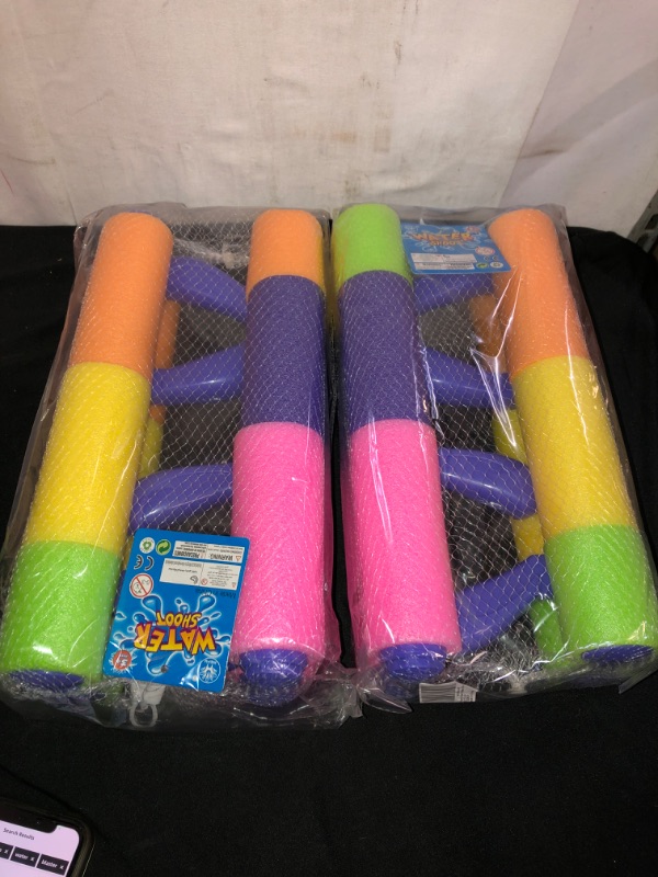 Photo 1 of KIDS WATERFOAM BLASTERS, 4 GUNS, 2 COUNT