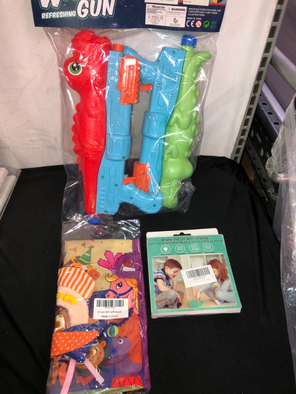 Photo 1 of 3PC LOT
2PC WATER GUNS
BABY FABRIC BOOK
POP IT FIDGET TOY
