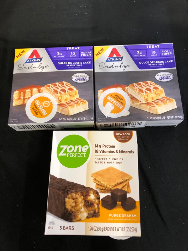 Photo 3 of 3PC LOT
Atkins Endulge Treat Dessert Bar Dulce De Leche Cake, 5 Count, EXP 01/27/2022, 2 COUNTZonePerfect Protein Bars, 

Fudge Graham, 14g of Protein, Nutrition Bars With Vitamins & Minerals, Great Taste Guaranteed, 5 Bars EXP 01/01/2022


