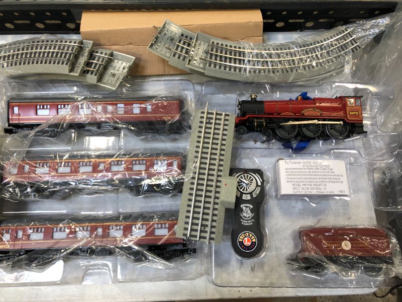 Photo 4 of Lionel Hogwarts Express LionChief 4-6-0 Set, with Bluetooth Capability, Electric O Gauge Model Train Set with Remote Black, 16.75 x 17.75 x 8.5 inches

