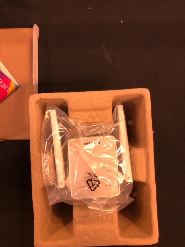 Photo 1 of NETGEAR Wi-Fi Range Extender EX6120 - Coverage Up to 1500 Sq Ft and 25 Devices with AC1200 Dual Band Wireless Signal Booster & Repeater (Up to 1200Mbps Speed), and Compact Wall Plug Design
