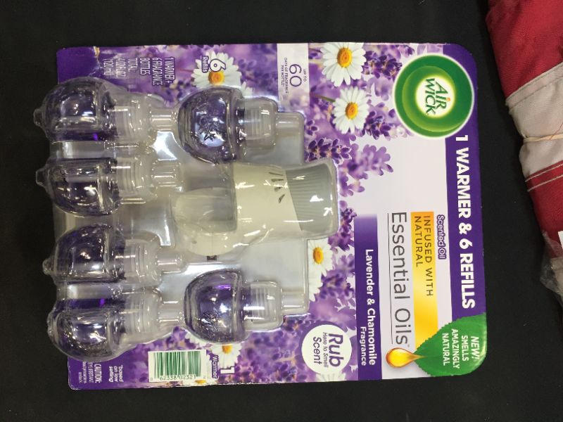 Photo 1 of Air Wick Scented Oil 6 Refills + Warmer, Air Freshner 
bundle of 2 