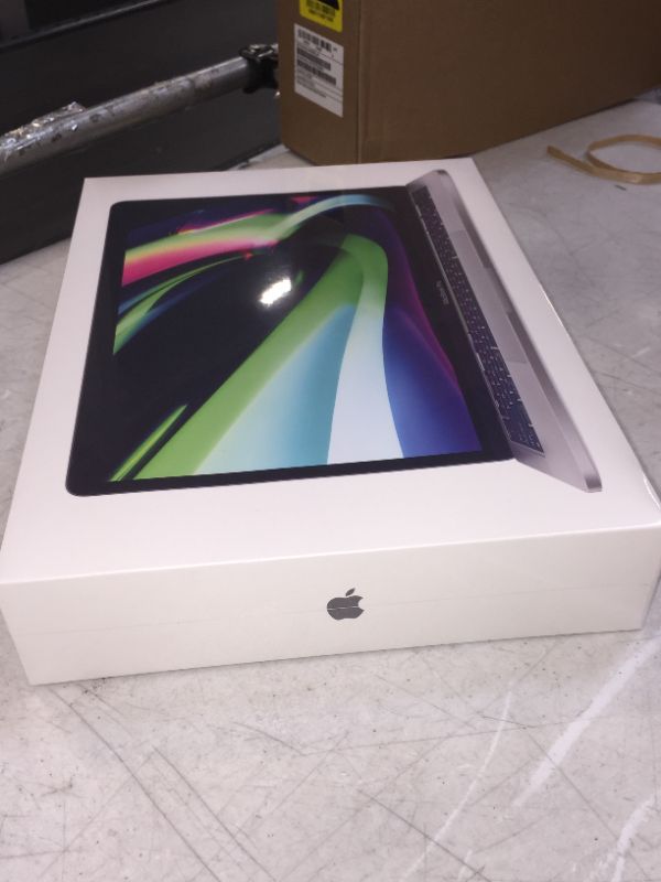 Photo 4 of 2020 Apple MacBook Pro with Apple M1 Chip (13-inch, 8GB RAM, 256GB SSD Storage) - Space Gray ----- BOX HAS VERY LITTLE DENT BUT ITEM NOT DAMAGED----
