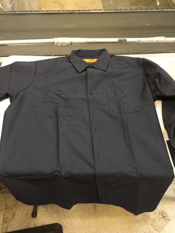 Photo 1 of XL BLUE BUTTON UP 