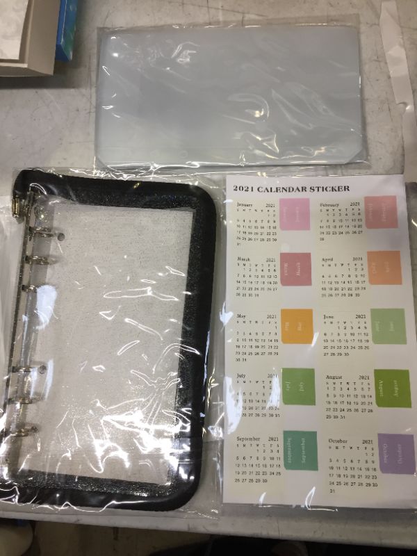 Photo 1 of HAUTOCO 12PCS A6 Binder Pockets A6 PVC Zipper Binder Wallet with Calendar Stickers, Loose Leaf Bags 6 Ring Cash Budget Binder Envelopes Wallet System
