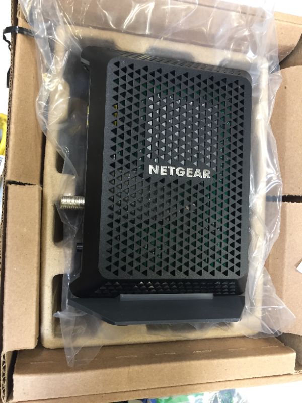 Photo 2 of NETGEAR CM700 (32x8) DOCSIS 3.0 Gigabit Cable Modem. Max download speeds of 1.4Gbps. Certified for XFINITY by Comcast, Time Warner Cable, Charter & more (CM700)
