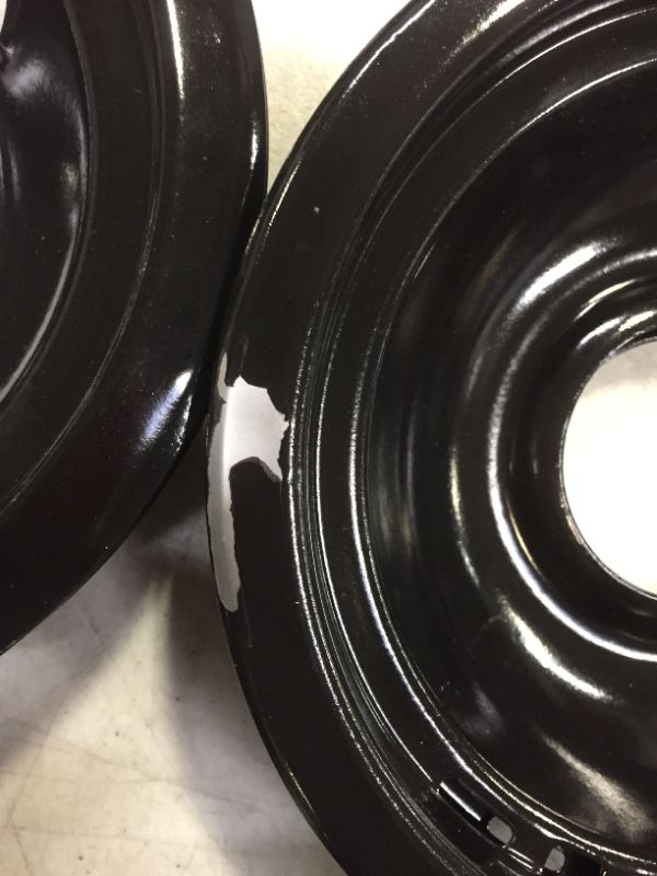 Photo 2 of Black Porcelain Drip Bowl for GE Electric Ranges (4-Pack)--slight chipping on one of the drip bowls
