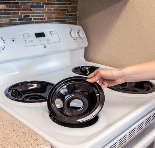 Photo 1 of Black Porcelain Drip Bowl for GE Electric Ranges (4-Pack)--slight chipping on one of the drip bowls
