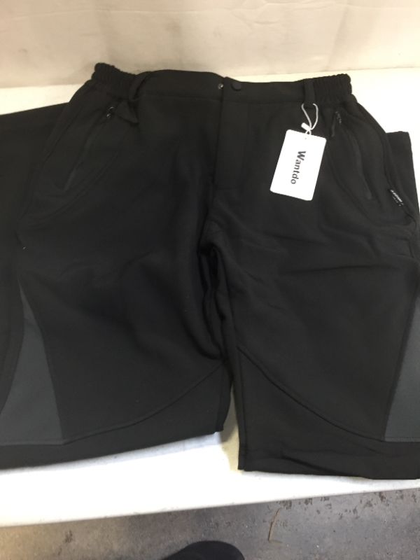 Photo 1 of pair of large black pants 