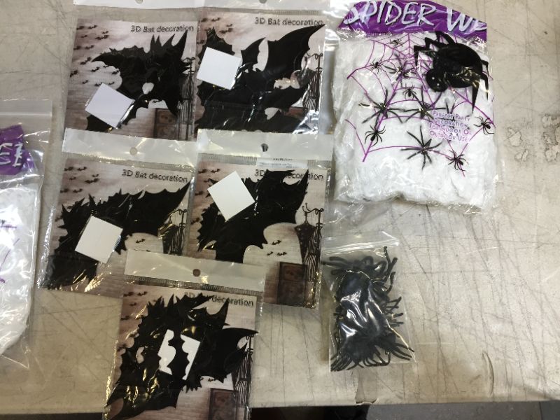 Photo 2 of 2 pack of artificial spider web decorations with 3D bats and spider figure toys