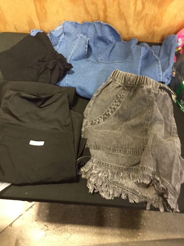 Photo 1 of assorted clothing sold as is various sizes