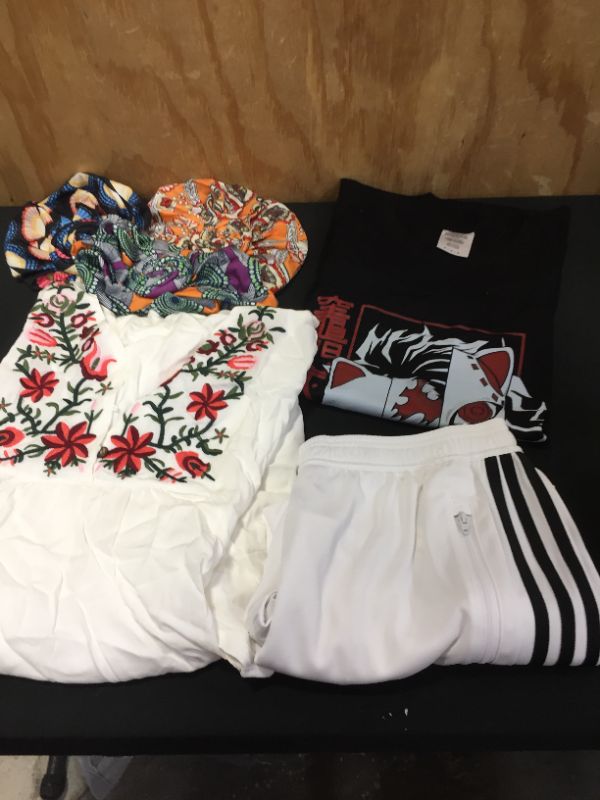 Photo 1 of assorted clothing sold as is various sizes