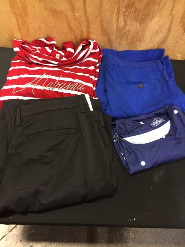 Photo 1 of assorted clothing sold as is various sizes