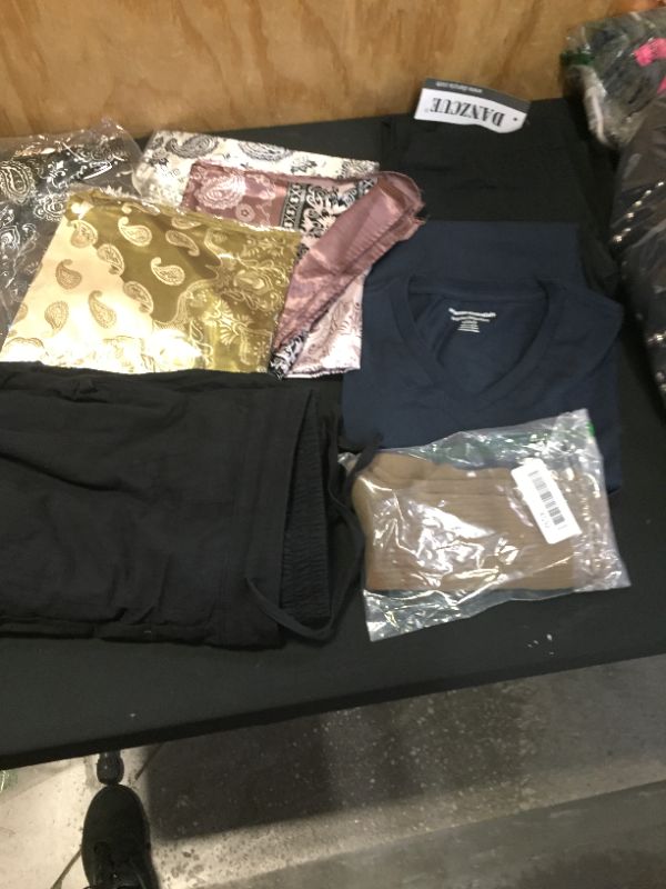 Photo 1 of assorted clothing sold as is various sizes