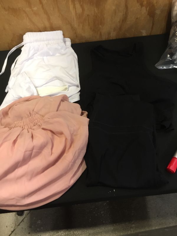 Photo 1 of assorted clothing sold as is various sizes