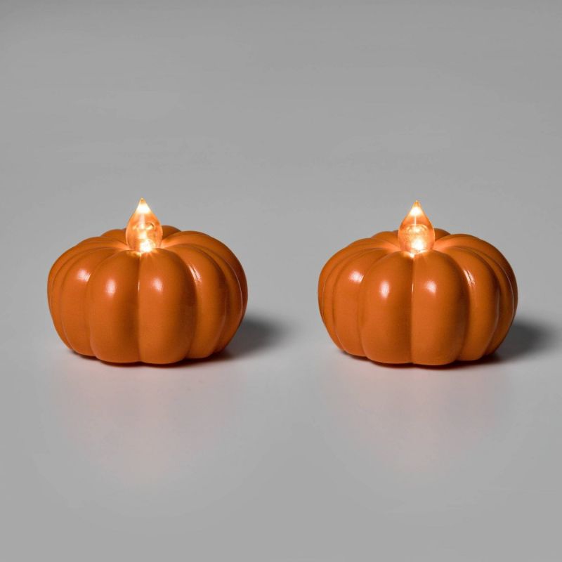 Photo 1 of 12pk LED Pumpkin Shaped Halloween Tea Lights - Hyde & EEK! Boutique™
