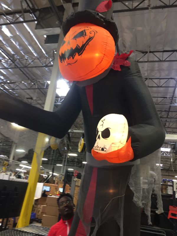 Photo 3 of 12 ft. Giant- Sized Pumpkin Head Reaper with Top Hat Airblown Halloween Inflatable