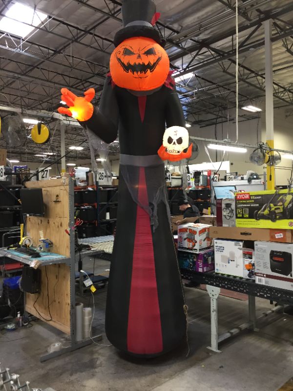 Photo 2 of 12 ft. Giant- Sized Pumpkin Head Reaper with Top Hat Airblown Halloween Inflatable