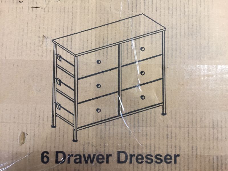 Photo 1 of 6 drawer dresser ---like new in the box 