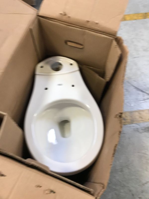 Photo 4 of American Standard Reliant 2-Piece 1.28 GPF Single Flush Round Toilet