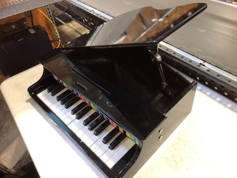 Photo 2 of Melissa  Doug Learn-To-Play Classic Grand Piano With 30 Keys, Color-Coded Songbook, and Non-Tip Bench