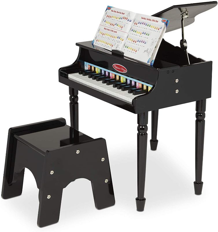 Photo 1 of Melissa  Doug Learn-To-Play Classic Grand Piano With 30 Keys, Color-Coded Songbook, and Non-Tip Bench