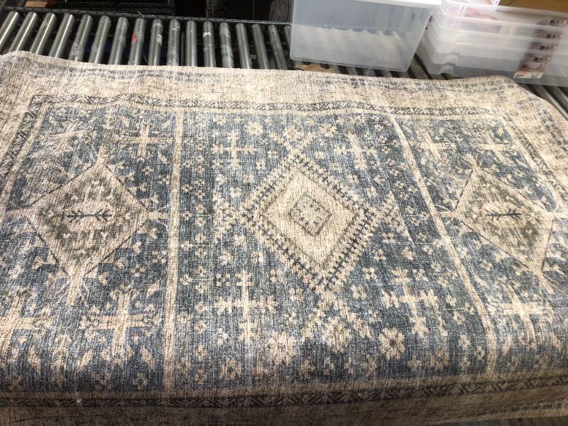 Photo 1 of 5 ft X 7 ft rug 
