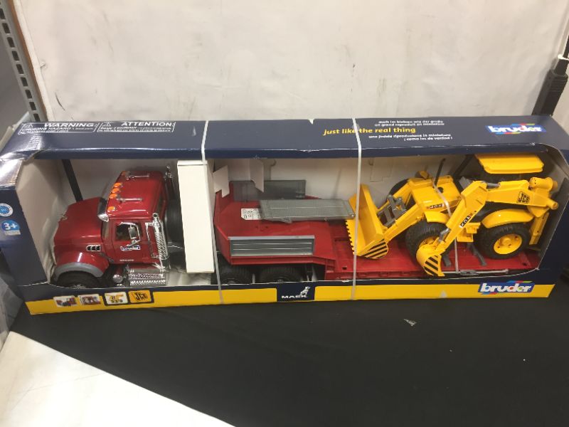 Photo 1 of Bruder 02813 Mack Granite Flatbed Truck with JCB Loader Backhoe
