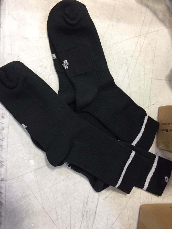 Photo 1 of 2 PACK OF LONG BLACK AND WHITE SOCKS 