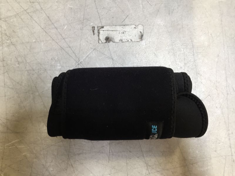 Photo 1 of Copper Fit ICE Unisex Adjustable Compression Back Brace Infused with Menthol and Coq10, Black
