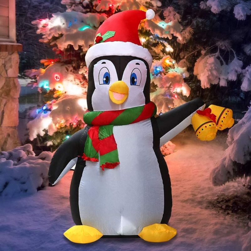 Photo 1 of Joiedomi Christmas Inflatable Decoration 5 FT Inflatable Holiday Life-Size Penguin with Built-in LEDs Blow Up for Christmas Party Indoor, Outdoor, Yard, Garden, Lawn Décor.
