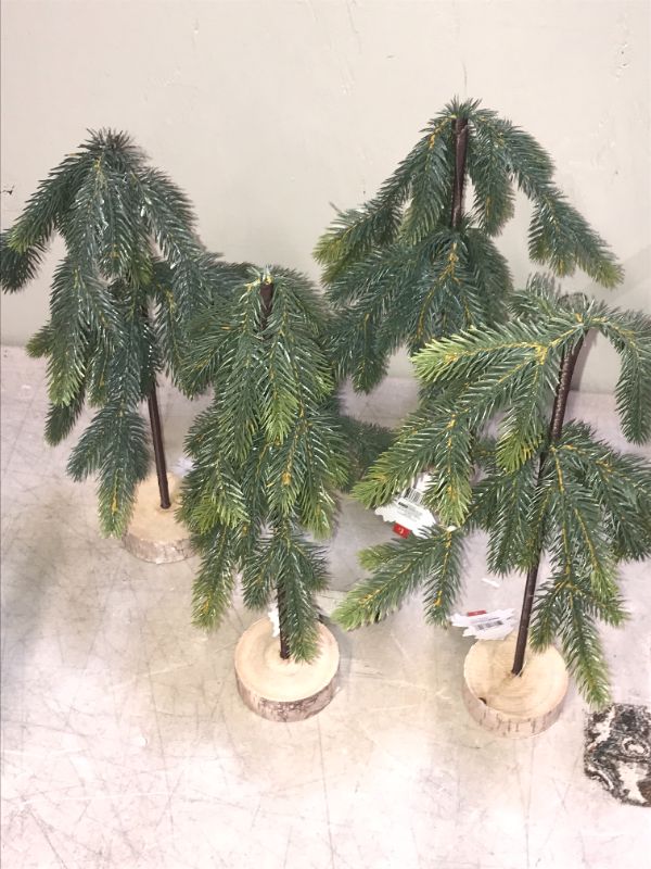 Photo 1 of 12 INCH FAKE DECORATIVE TREES 4 PACK