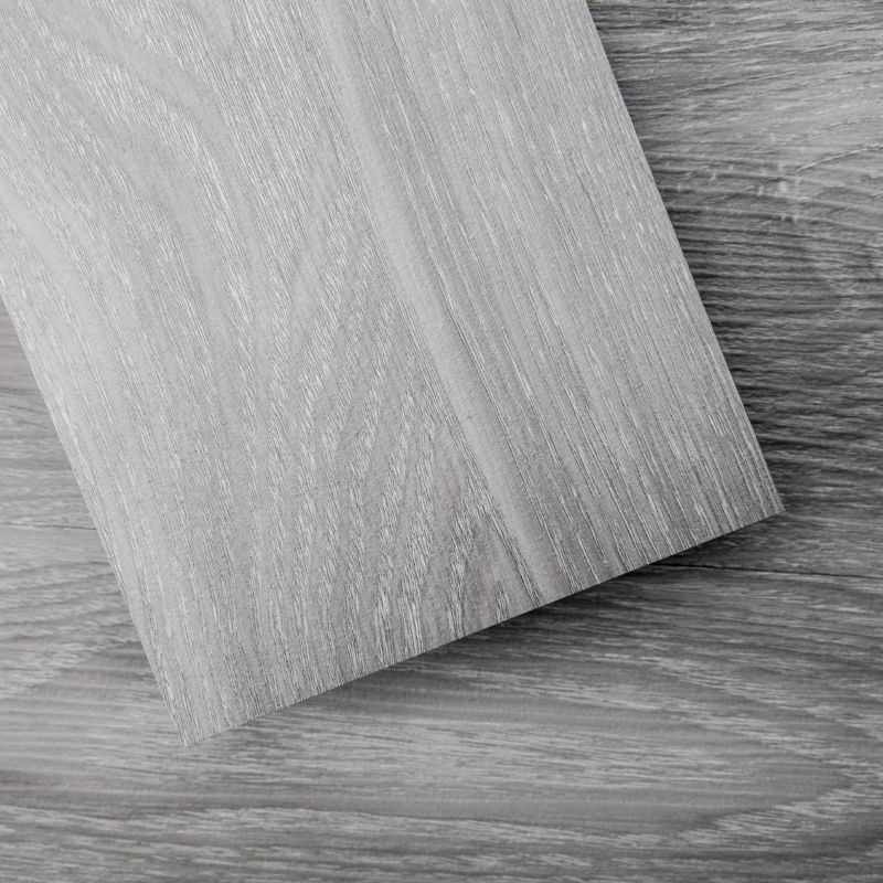 Photo 1 of Art3d Peel and Stick Floor Tile Vinyl Wood Plank 18 Sq.Ft, Light Grey, Rigid Surface Hard Core Easy DIY Self-Adhesive Flooring
