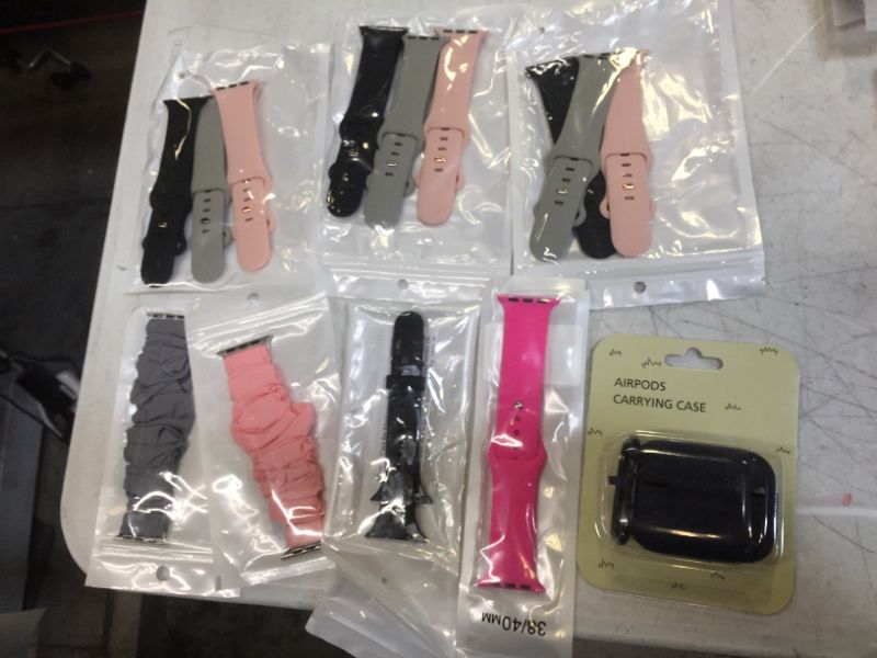 Photo 1 of 13 iwatch bands and air pods carrying case  