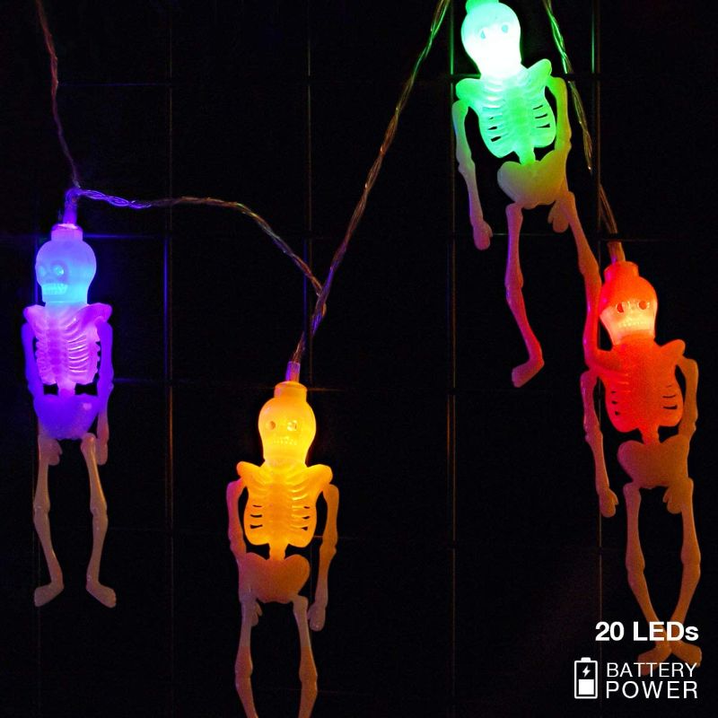 Photo 1 of Halloween Lights Decorations Halloween Skeleton Skull String Lights, 10ft 20 LEDs Battery Operated Colorful Fairy Lights for Halloween Indoor/Outdoor Decor 2 pack 
