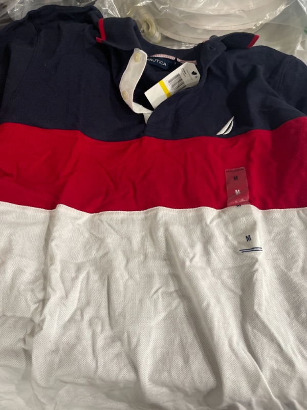 Photo 1 of MENS POLO MEDIUM 