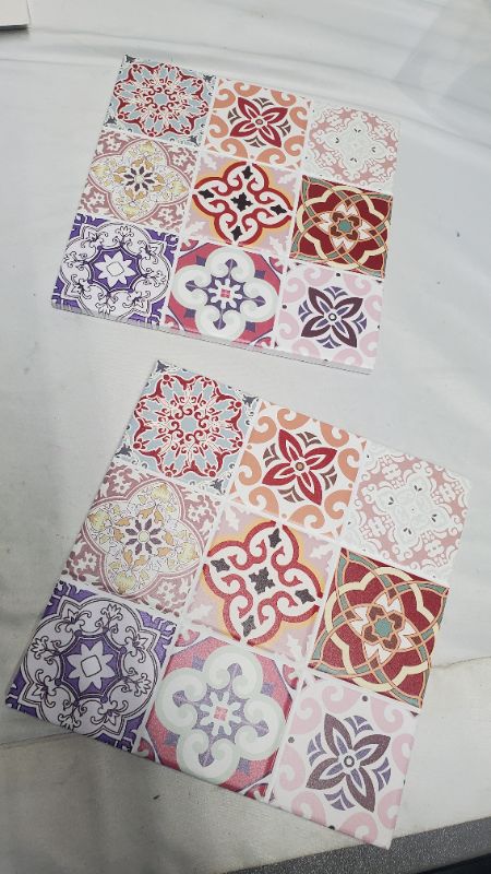 Photo 1 of CERAMIC TRIVETS 2PCS