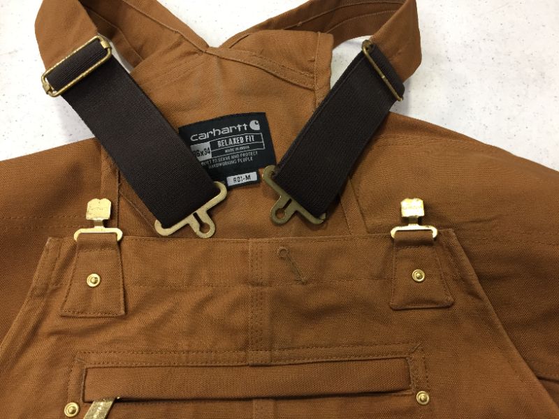 Photo 1 of RUGGED FLEX® LOOSE FIT CANVAS BIB OVERALL,SIZE 36X34 -----Front Buckles have to be turned to lock into place 