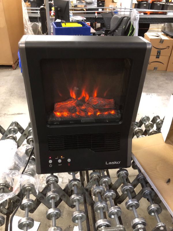 Photo 1 of Lasko CA20100 Ultra Ceramic Fireplace Heater, Black

