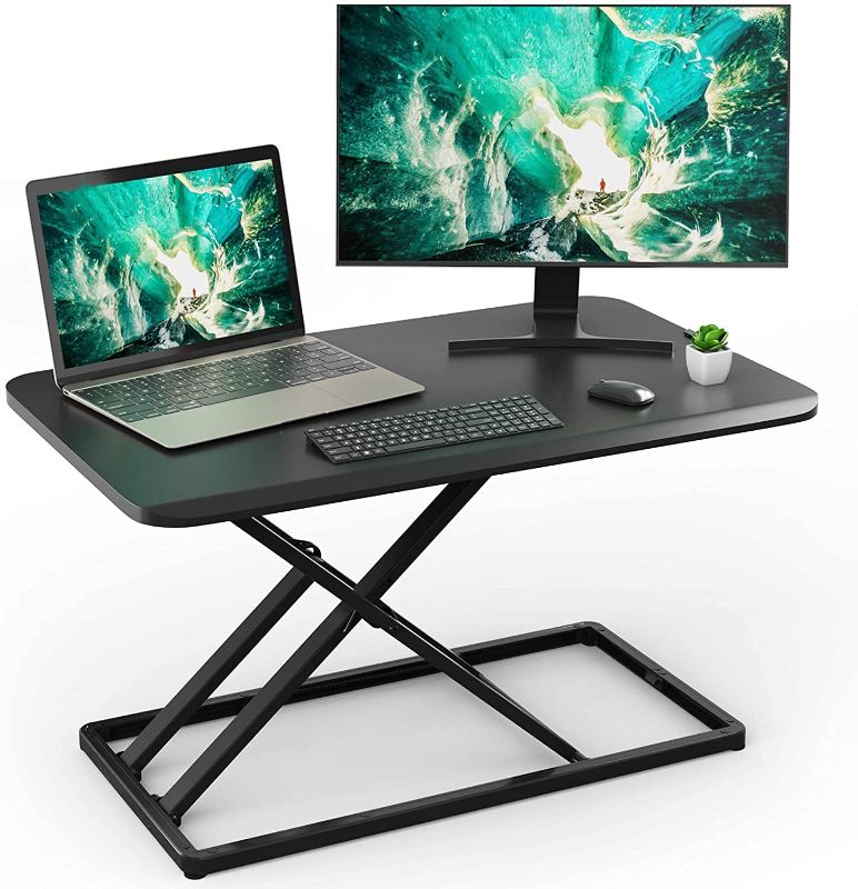 Photo 2 of Standing Desk Converter Height Adjustable Stand up Desktop Riser, Sit to Stand Gas Spring Workstation 28.5 inches for Laptop & Monitors for Home Office...
