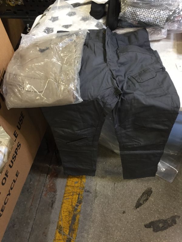 Photo 1 of  2 pair med size cargo pants 