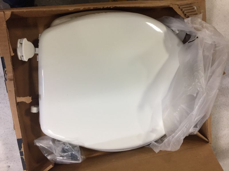 Photo 1 of TOILET SEAT WHITE PLASTIC 